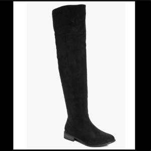 Black over the knee flat boots. NEVER WORN!